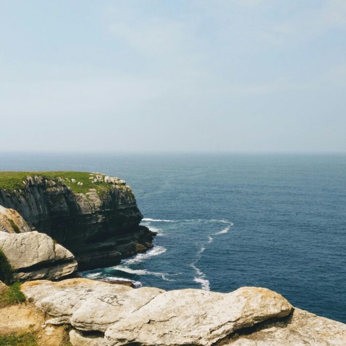 Breathtaking view of cliffs and ocean in Santander, Cantabria, Spain.