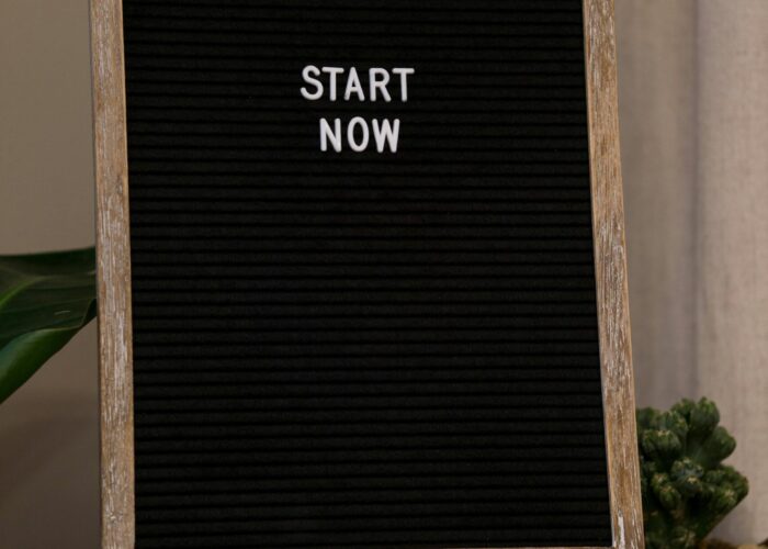 Wooden framed board with 'Start Now' message for motivation and inspiration.